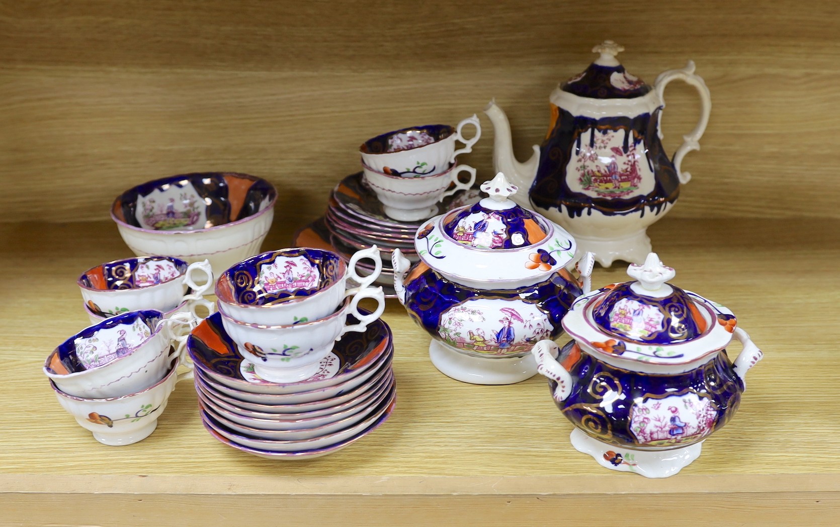 A quantity of Gaudy Welsh lustre tea wares with chinoiserie motifs